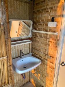 Ένα μπάνιο στο ไร่ณัฐลิษา โฮมสเตย์