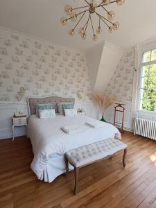 Postel nebo postele na pokoji v ubytování Manoir de Camblain