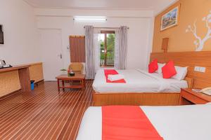 Letto o letti in una camera di Basundhara Resort Pokhara