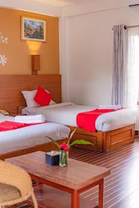 Letto o letti in una camera di Basundhara Resort Pokhara