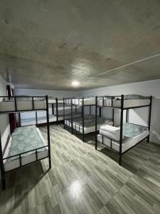 Ένα ή περισσότερα κρεβάτια σε δωμάτιο στο Hostel VANTA