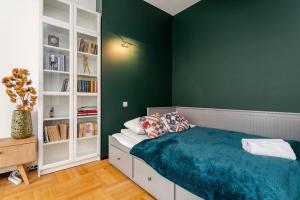 Posteľ alebo postele v izbe v ubytovaní Peanut Premium Apartment Ochota