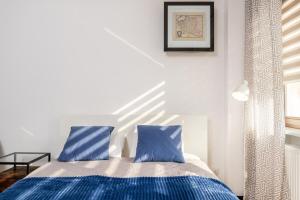 Posteľ alebo postele v izbe v ubytovaní Peanut Premium Apartment Ochota