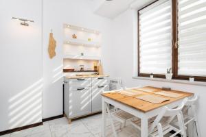 Kuchyňa alebo kuchynka v ubytovaní Peanut Premium Apartment Ochota