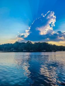 a view of a large body of water at Lakefront Sunsets, Hot Tub, Pool Table, Kayaks in Lake Ariel
