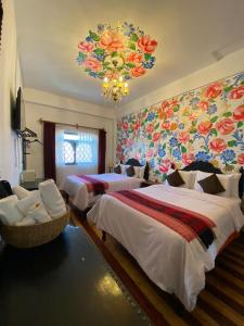 Postel nebo postele na pokoji v ubytování Casona Dorada Hotel Cusco