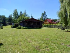 Fotografia z galérie ubytovania Domek nad jeziorem -Mazury- Linia Brzegowa v destinácii Piotrowice