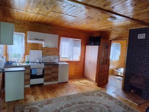 Fotografia z galérie ubytovania Domek nad jeziorem -Mazury- Linia Brzegowa v destinácii Piotrowice