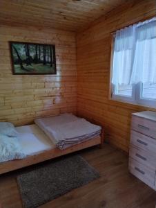 Fotografia z galérie ubytovania Domek nad jeziorem -Mazury- Linia Brzegowa v destinácii Piotrowice + 10 fotografií