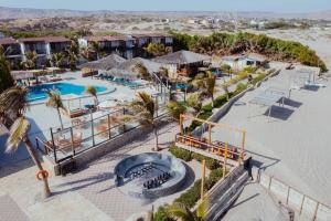 an aerial view of a resort with a pool at El Refugio de Vichayito in Vichayito