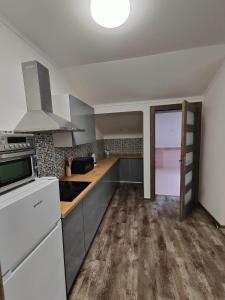 Kuchyňa alebo kuchynka v ubytovaní Villa Pirken Hammer