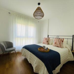 Postel nebo postele na pokoji v ubytování Apartamento Beirada 2 en Porto de Portocubelo con parking