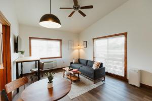 a living room with a couch and a table at Mt Merritt Suite Boutique Hotel Experience in Kalispell +10 photos