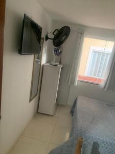 TV a/nebo společenská místnost v ubytování Pousada dos amigos