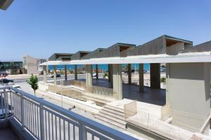 a view of a building with a balcony at Spacious seaview apartment in Heraklion in Heraklio