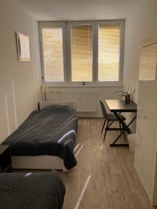Postel nebo postele na pokoji v ubytování Primo Apartman