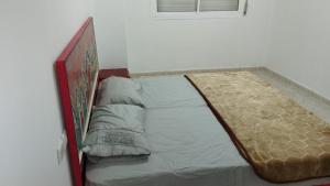 Postel nebo postele na pokoji v ubytování Hotel Al Andalous