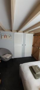 Postel nebo postele na pokoji v ubytování Penny Cottage