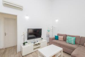TV/Unterhaltungsangebot in der Unterkunft Playa del Aguila Bungalow con Terraza Solarium