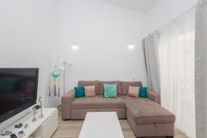 TV/Unterhaltungsangebot in der Unterkunft Playa del Aguila Bungalow con Terraza Solarium