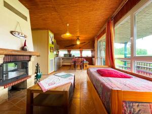 Postel nebo postele na pokoji v ubytování Chalets des Trois Hêtres