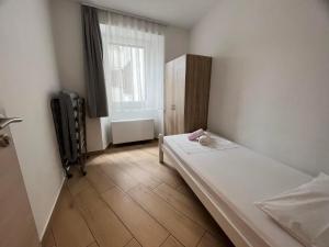 a small room with a bed and a window at Villa Ivanka in Koper +14 photos