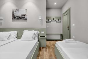 Letto o letti in una camera di Villa Zoi A Stay to Remember I Located inside the Castle of Elbasan, on a historic Roman road Via Egnatia I Homemade Breakfast