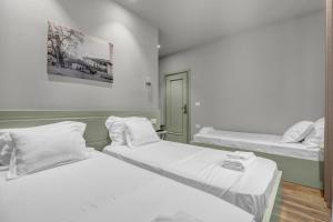 Letto o letti in una camera di Villa Zoi A Stay to Remember I Located inside the Castle of Elbasan, on a historic Roman road Via Egnatia I Homemade Breakfast