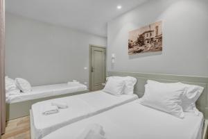 Letto o letti in una camera di Villa Zoi A Stay to Remember I Located inside the Castle of Elbasan, on a historic Roman road Via Egnatia I Homemade Breakfast