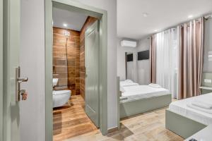 Letto o letti in una camera di Villa Zoi A Stay to Remember I Located inside the Castle of Elbasan, on a historic Roman road Via Egnatia I Homemade Breakfast