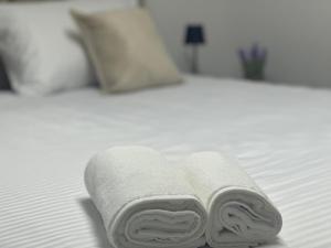 Voodi või voodid majutusasutuse Next Rooms toas