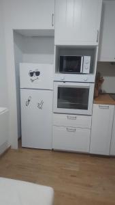 Una cocina o cocineta en Apartamento Loft con vistas al mar y ciudad