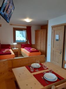 Posteľ alebo postele v izbe v ubytovaní Chalet Beatrice