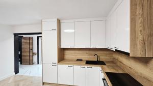 Dapur atau dapur kecil di Ukośna Apartaments