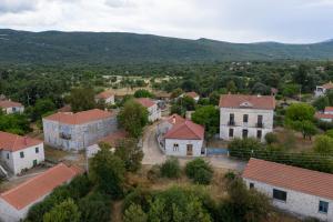 an aerial view of a small village with houses at Old Winery Stonehouse in Peletá