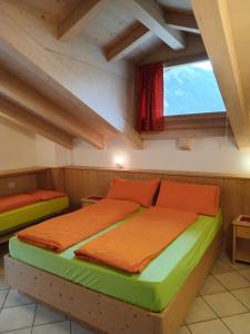 Posteľ alebo postele v izbe v ubytovaní Chalet Beatrice