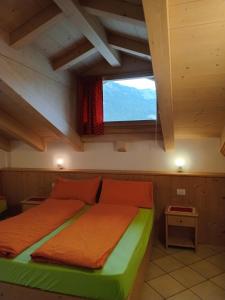 Posteľ alebo postele v izbe v ubytovaní Chalet Beatrice
