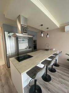 Kuchyň nebo kuchyňský kout v ubytování Hotter Apartman