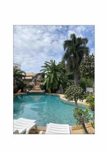 Πισίνα στο ή κοντά στο Rawai Poo Villa