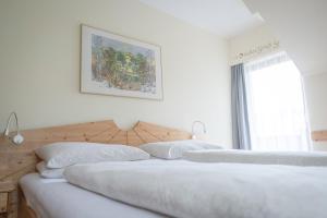 Postel nebo postele na pokoji v ubytování Gästehaus Maurer/Bader