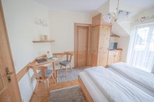 Postel nebo postele na pokoji v ubytování Gästehaus Maurer/Bader