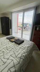 En eller flere senge i et værelse på Vista a Magallanes + 8 billeder