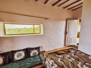 Postel nebo postele na pokoji v ubytování La Belle Etoile