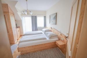 Postel nebo postele na pokoji v ubytování Gästehaus Maurer/Bader