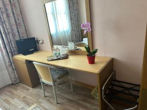 TV a/nebo společenská místnost v ubytování Hotel Raffaello Venice