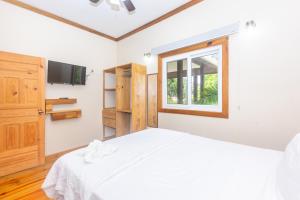 Voodi või voodid majutusasutuse Wescot Villas Sky View toas