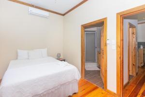 Postel nebo postele na pokoji v ubytování Wescot Villas Sky View