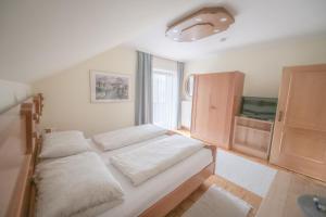 Postel nebo postele na pokoji v ubytování Gästehaus Maurer/Bader