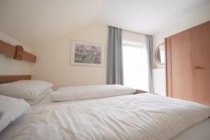 Postel nebo postele na pokoji v ubytování Gästehaus Maurer/Bader