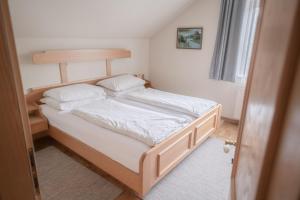Postel nebo postele na pokoji v ubytování Gästehaus Maurer/Bader